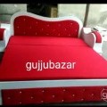 Red and white sofa cum bed