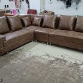L shape sofa with pillows