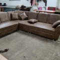 Corner sofa with pillows in Bhatar Surat