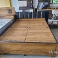 Double bed with head cupsor