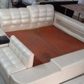 Designer double bed with seating sofa and storage