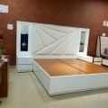wooden bed without mattress